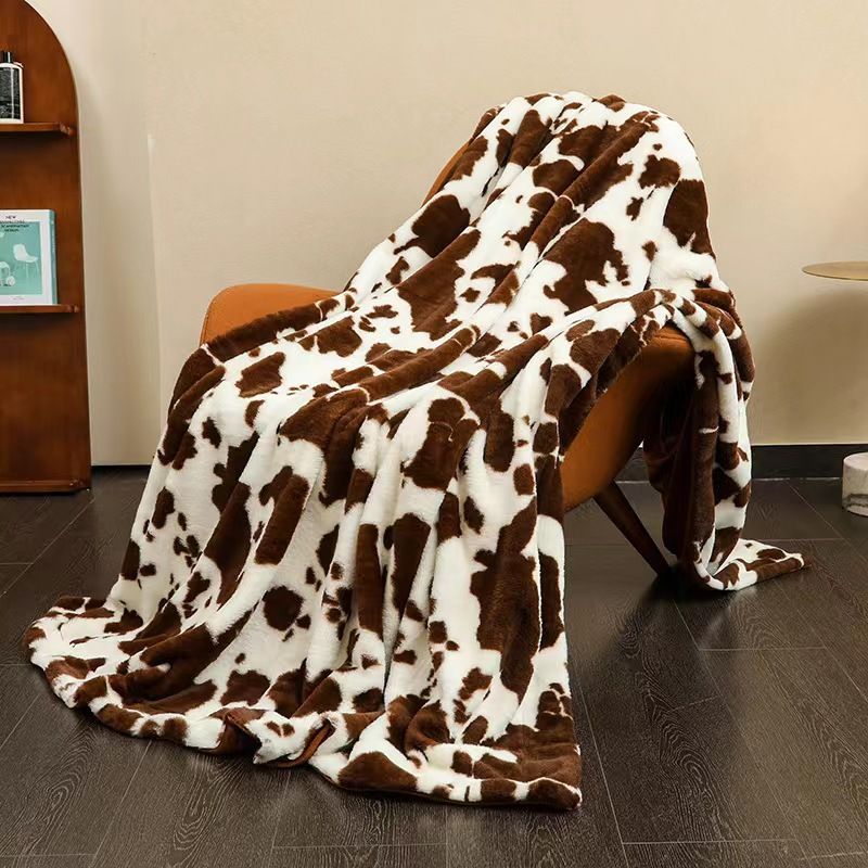 Coperta con stampa di mucca