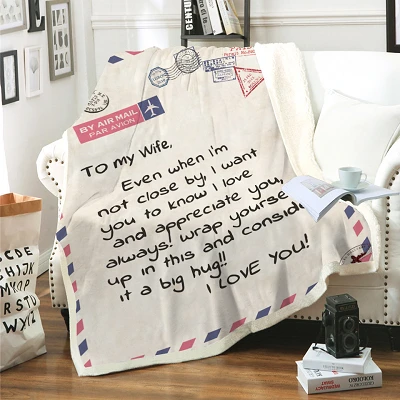 Coperta in pile con motivo a lettere
