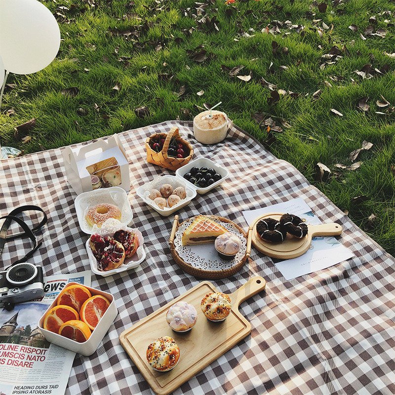 Coperta e tappetino da picnic in acrilico al 100%.