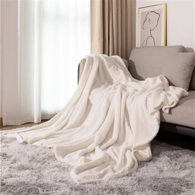 Coperta in pile corallo jacquard