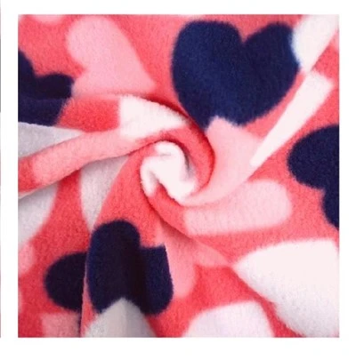 Tessuto in pile polare double face con stampa Love