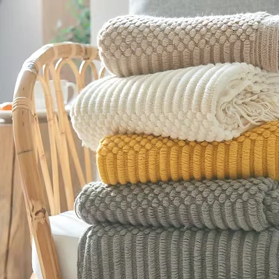 Coperta intrecciata in maglia