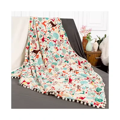Coperta di peluche di Natale con pom pon